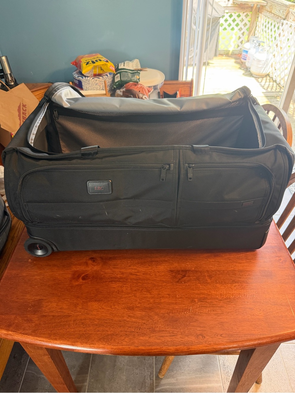 LRG Black Rolling Duffel with Exterior Pockets
